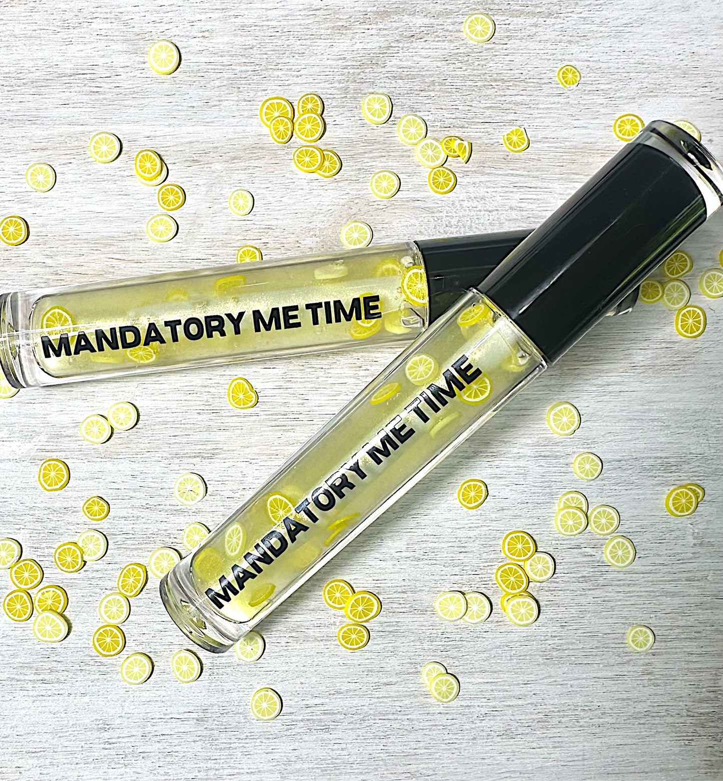 Cute Lemonade Lip Gloss with lemon polymers pieces
