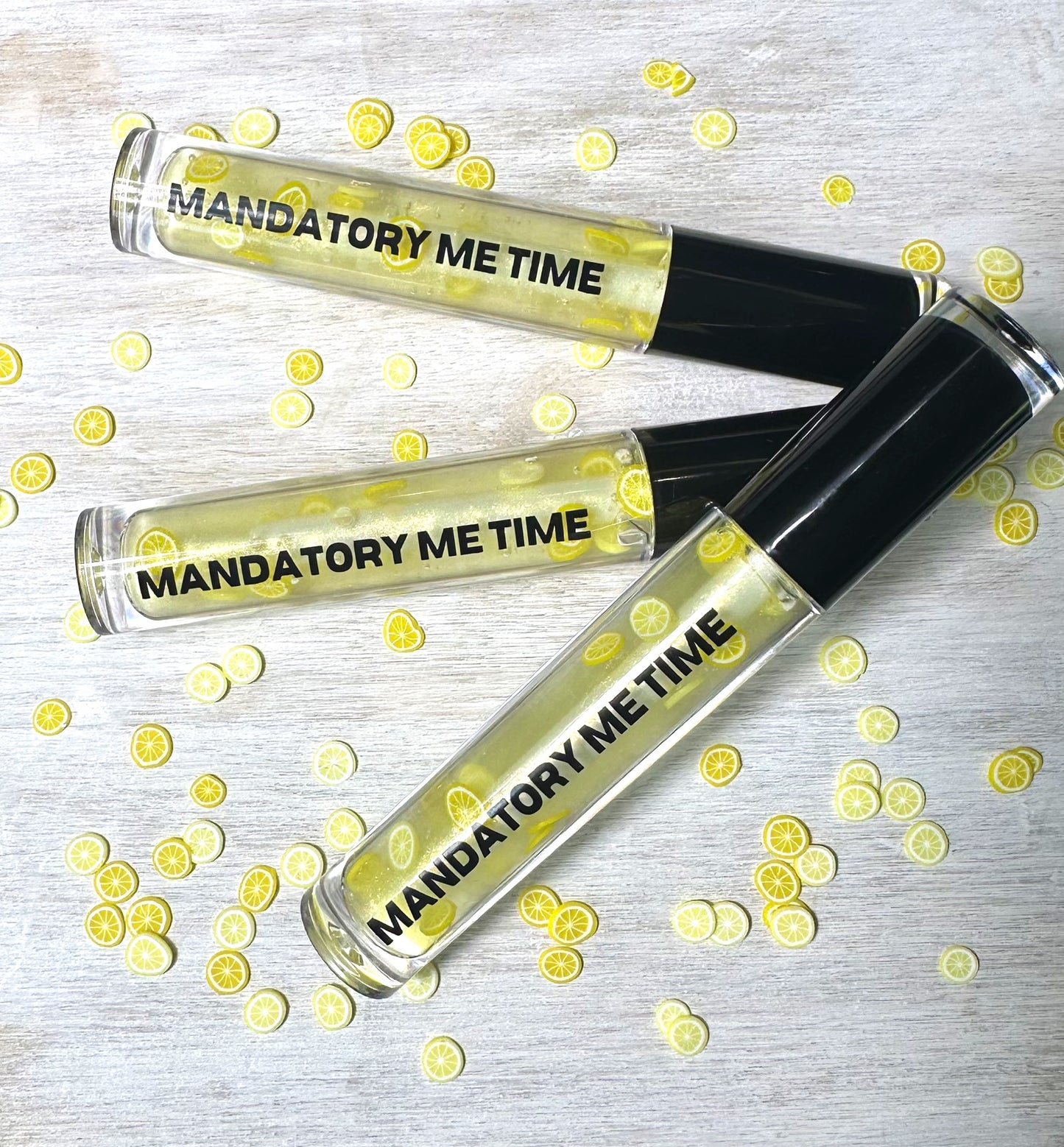Three lemonade flavored lip glosses by mandatory me time