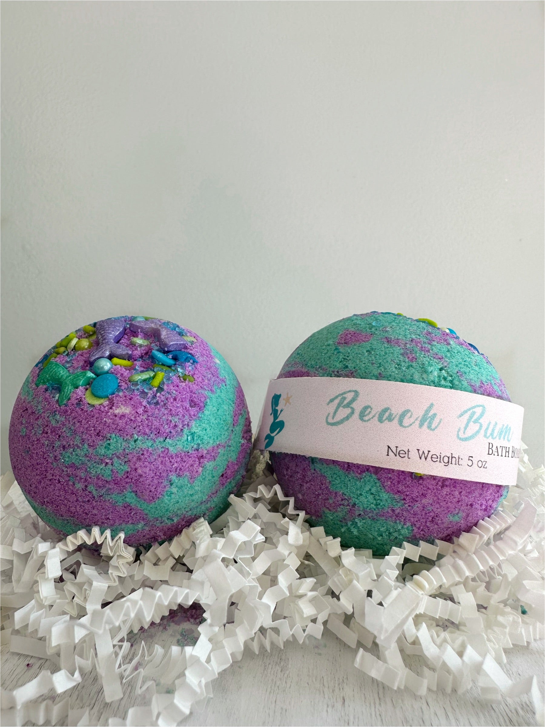 Purple and Turquoise Round Beach Bum Bath Bomb topped with Mermaid Sprinkles