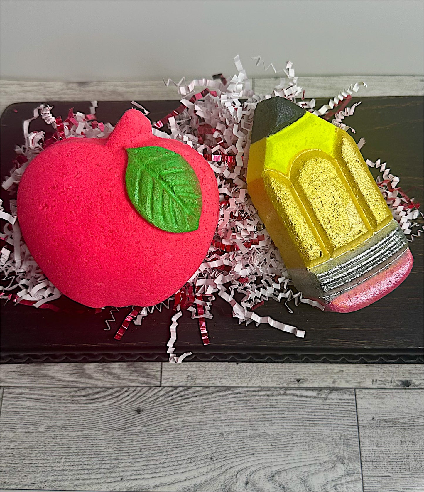 Large Apple Bath Bomb next to Hand Painted Pencil Bath Bomb Back to School Gift