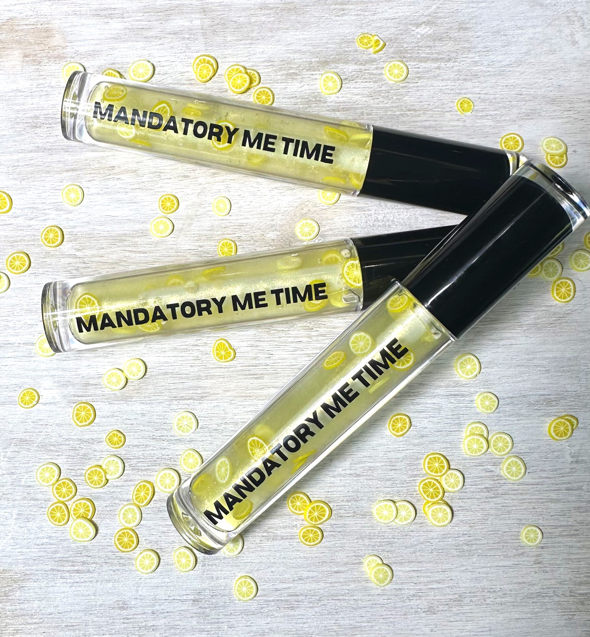 Three lemonade flavored lip glosses by mandatory me time